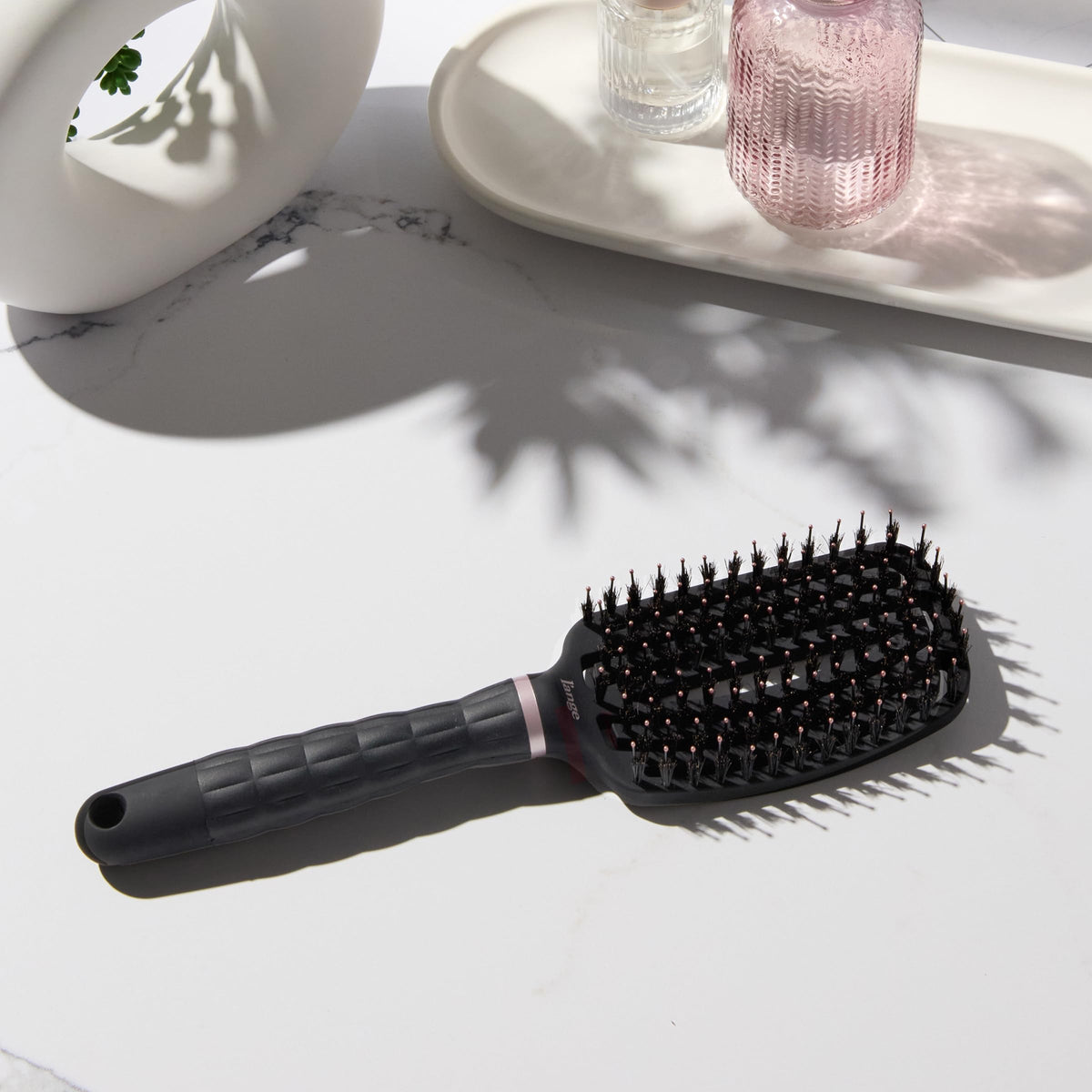 L'ANGE HAIR detangling paddle brush non-slip grip for comfortable daily use.