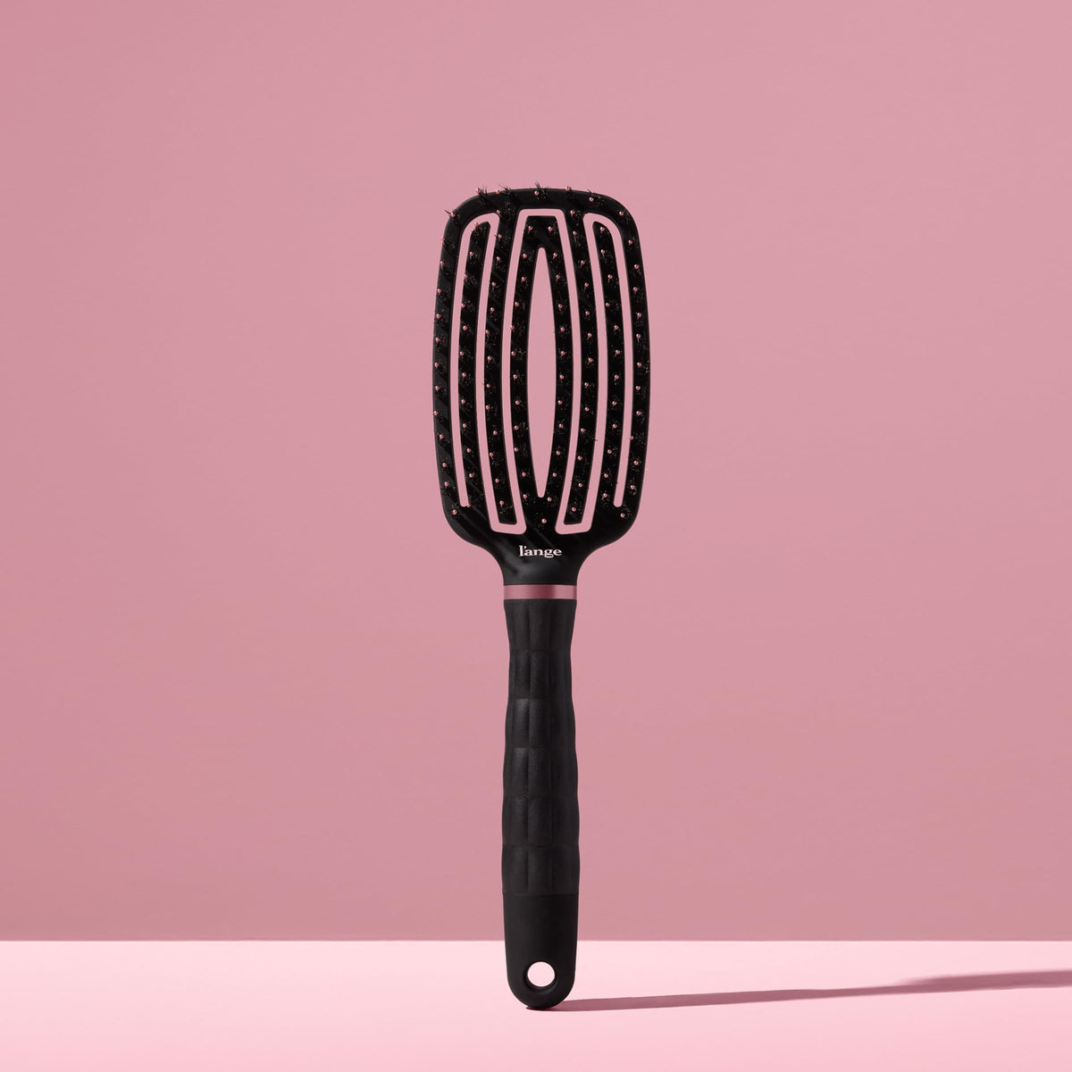 L'ANGE HAIR detangling paddle brush delivers smooth shine and reduced frizz.