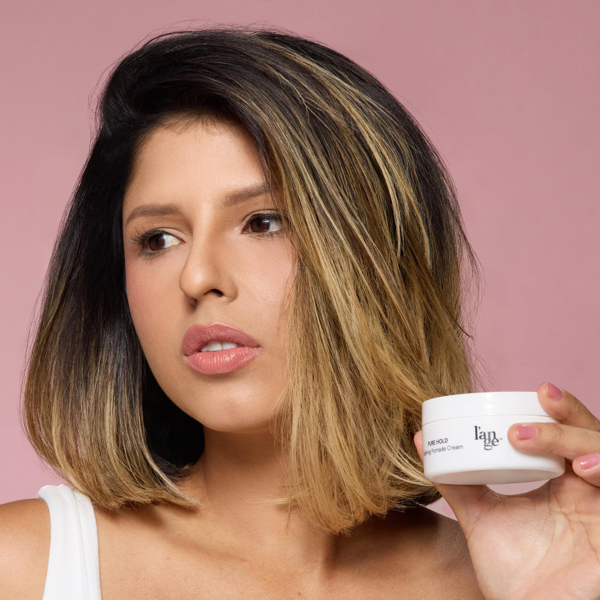 Lange Hair Pomade collection packaging showcasing versatile styling options