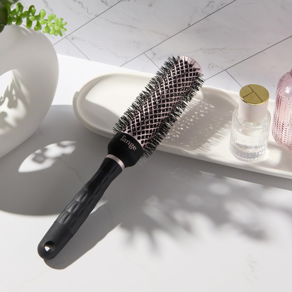 L'ANGE HAIR VolumePro brush side view shows ergonomic, non-slip grip for comfortable styling.