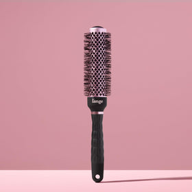 L'ANGE HAIR VolumePro brush styling long hair for volume and shine.