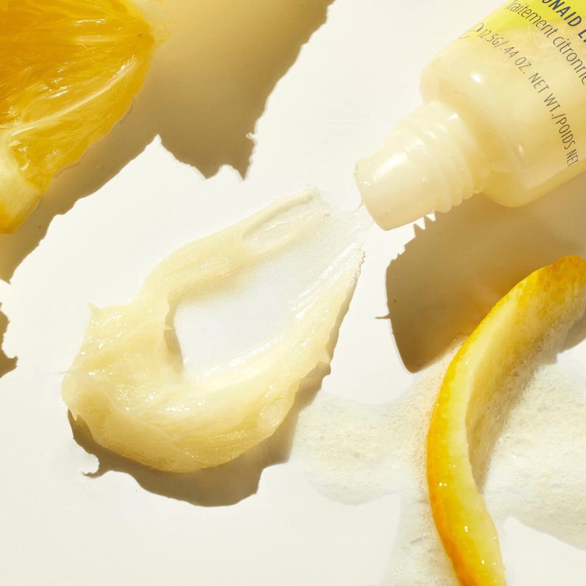 Lanolips Lemonaid lanolin ingredient visual highlighting deep hydration.