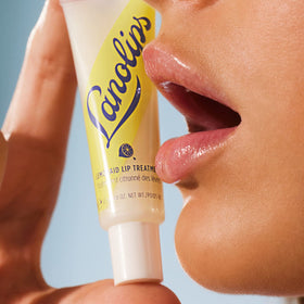 Lanolips Lemonaid lemon oil detail close-up for gentle exfoliation.