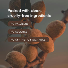 Close-up texture reveals creamy formula with almond oil and omega fatty acids