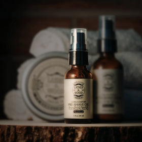 Lather and Wood head shaving with pre-shave oil for nick-free results.