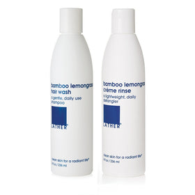 LATHER Bamboo Lemongrass Shampoo bottle on a sink, daily moisturizing for all hair types.