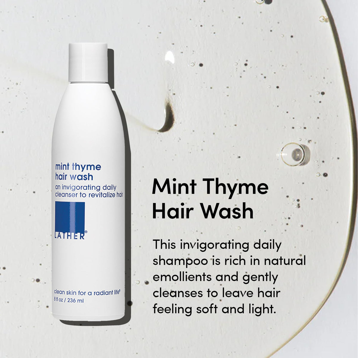 LATHER Mint Thyme Hair Wash close-up of ingredients highlights chamomile, cucumber for soothing scalp.