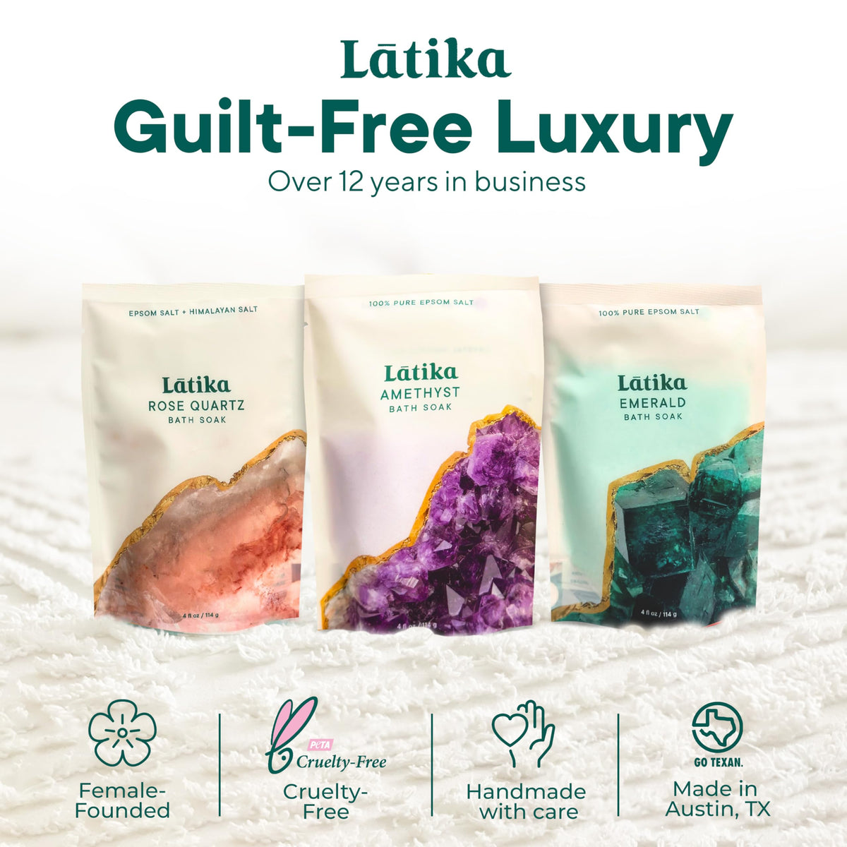 Latika Geode bath set in tub with bubbles and steam.