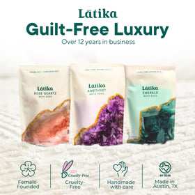 Latika Geode bath set in tub with bubbles and steam.