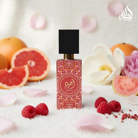 Spray nozzle dispensing Lattafa Ajwad Pink to Pink fragrance all day