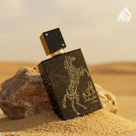 Lattafa Lail Maleki flatlay bottle, elegant centerpiece for vanity.