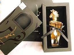 Lattafa Maahir base notes emphasize sandalwood and vanilla for smooth lasting warmth.
