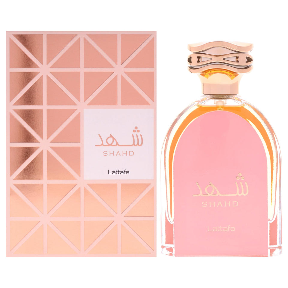 Lattafa Shahd pink glass bottle shown, a versatile unisex fragrance for all season wear.