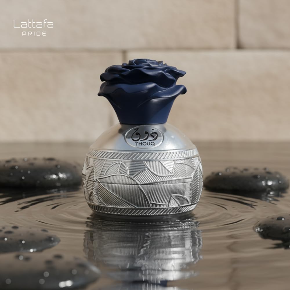 Lattafa Thouq unisex EDP spray mist suggesting easy daily use