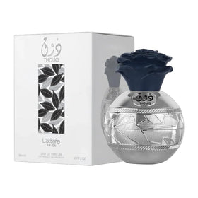 Lattafa Thouq unisex EDP top notes bergamot and litchi for an uplifting opening