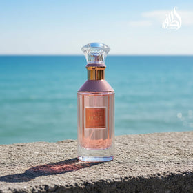 Lattafa Velvet Rose bottle in hand, ready-to-wear look for daily use.
