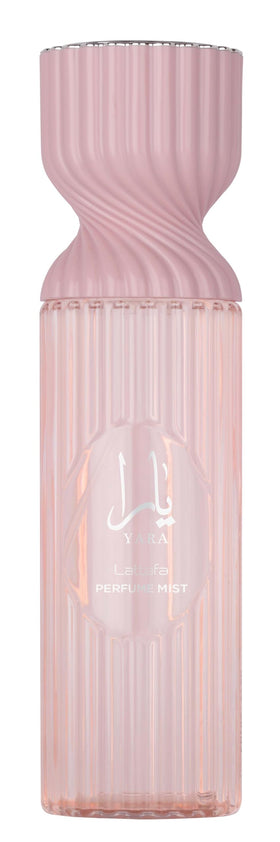 Lattafa Yara bottle-pour close-up, showcasing tangerine and orchid notes for everyday freshness.