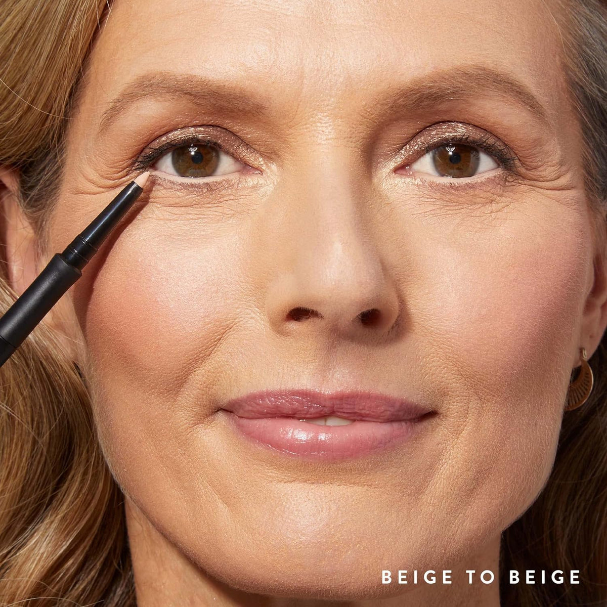 LAURA GELLER INKCredible Gel Eyeliner beige pencil close-up shows creamy texture