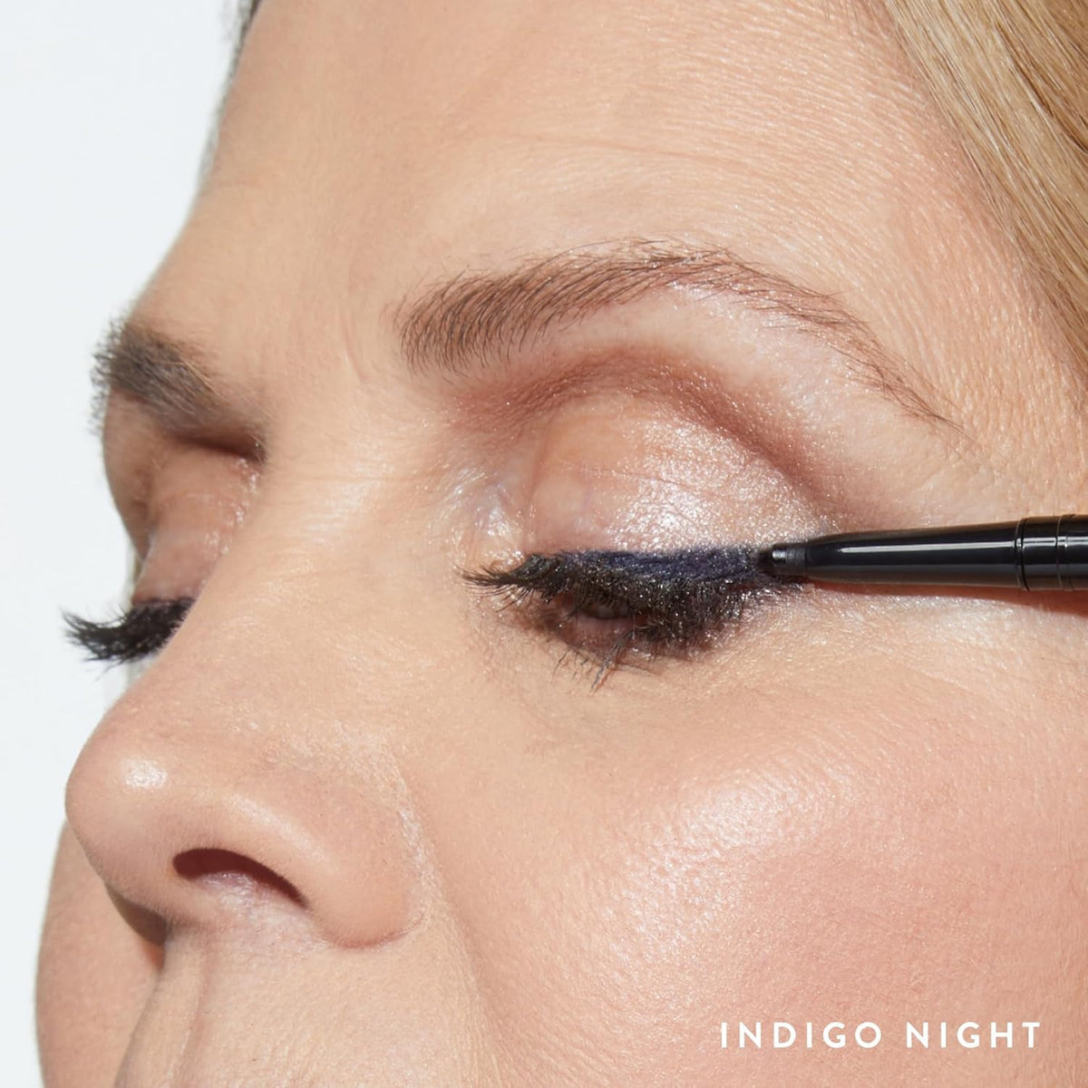 LAURA GELLER Inkcredible Gel Eyeliner Indigo Night pencil close-up showing creamy, precise tip.