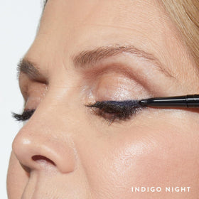 LAURA GELLER Inkcredible Gel Eyeliner Indigo Night pencil close-up showing creamy, precise tip.
