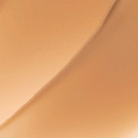 LAURA GELLER NEW YORK Bright Stuff under-eye swatch demonstrates light coverage