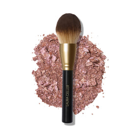 Laura Geller New York Classic Bronzer Brush close-up showing fluffy bristles for effortless blending.