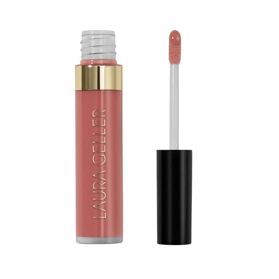 Laura Geller New York Color Luster Lip Gloss Cookie Dough bottle shows sheer color with luminous shine.