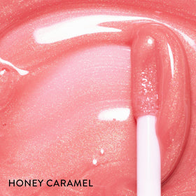 LAURA GELLER NEW YORK Color Luster Lip Gloss Honey Caramel packaging showcases the elegant tube.