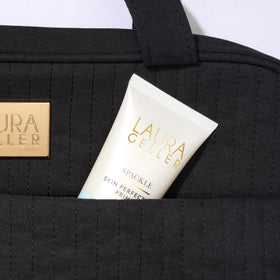 Laura Geller New York durable mesh lining lets you see contents at a glance.