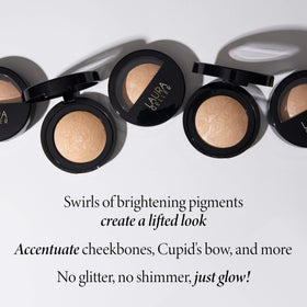  Laura Geller New York inner eye corners brightening with a subtle glow.