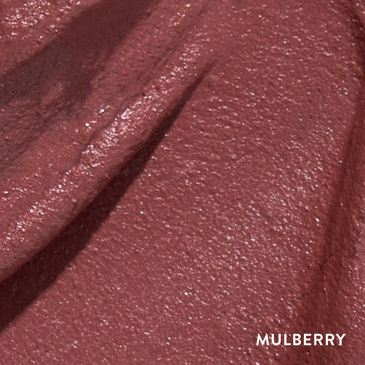 LAURA GELLER NEW YORK Kajal Longwear Matte Lip Color Mulberry built-in sharpener demonstrates precise liner edge