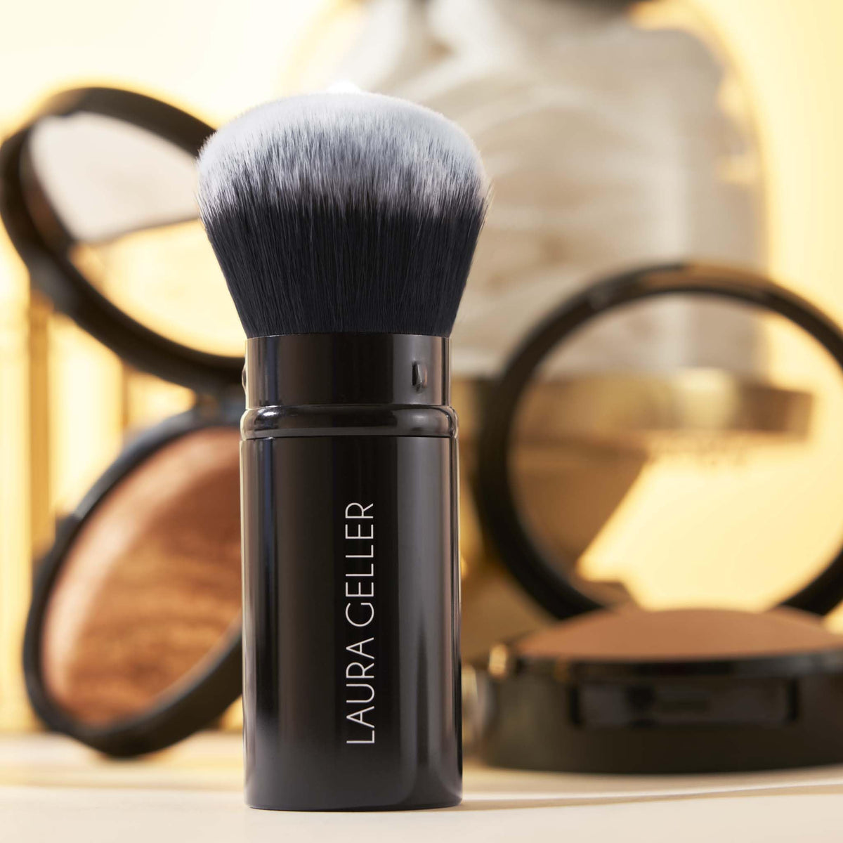 LAURA GELLER NEW YORK Kit in-use portrait demonstrating everyday makeup routine.