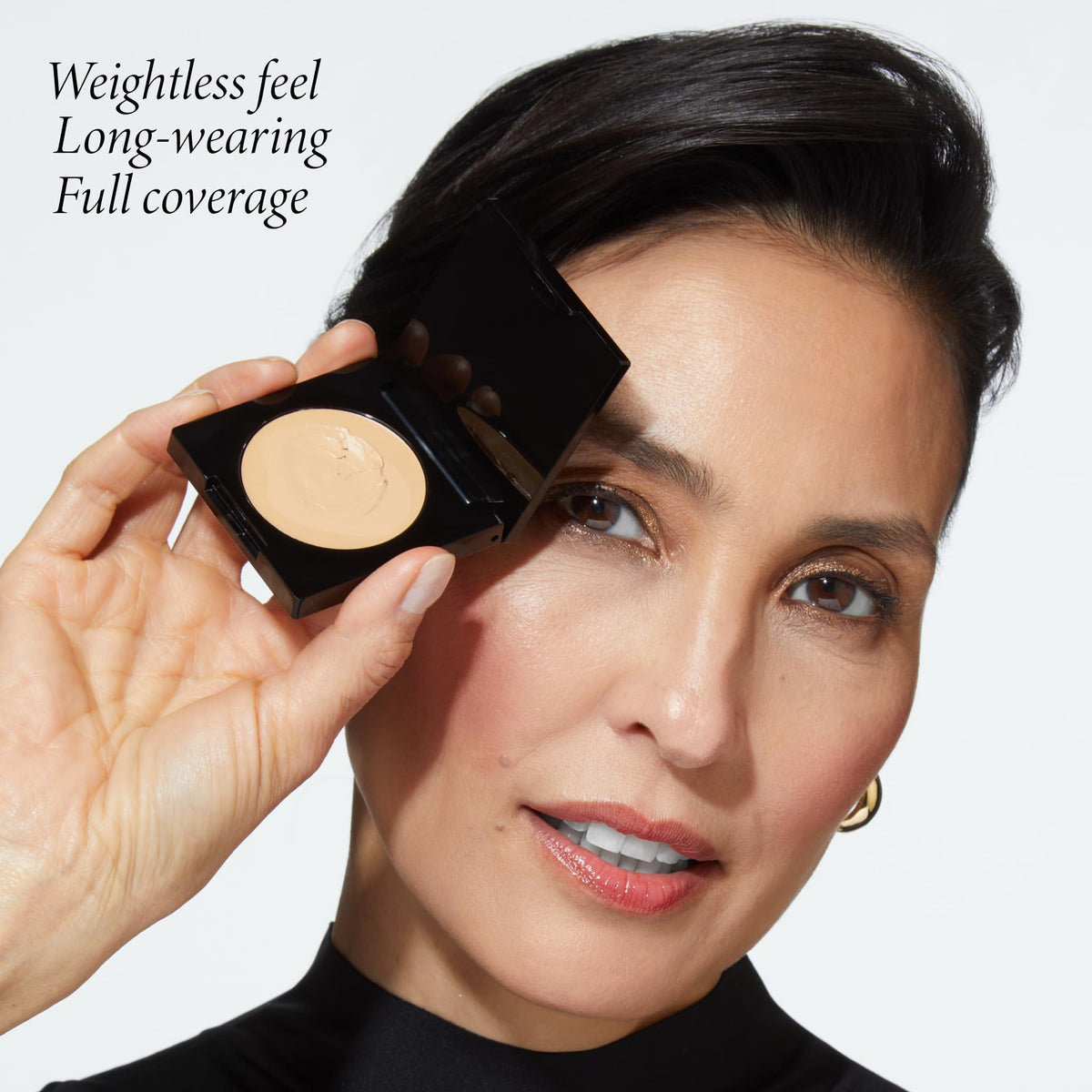 LAURA GELLER NEW YORK concealer applied with fingers for seamless blend