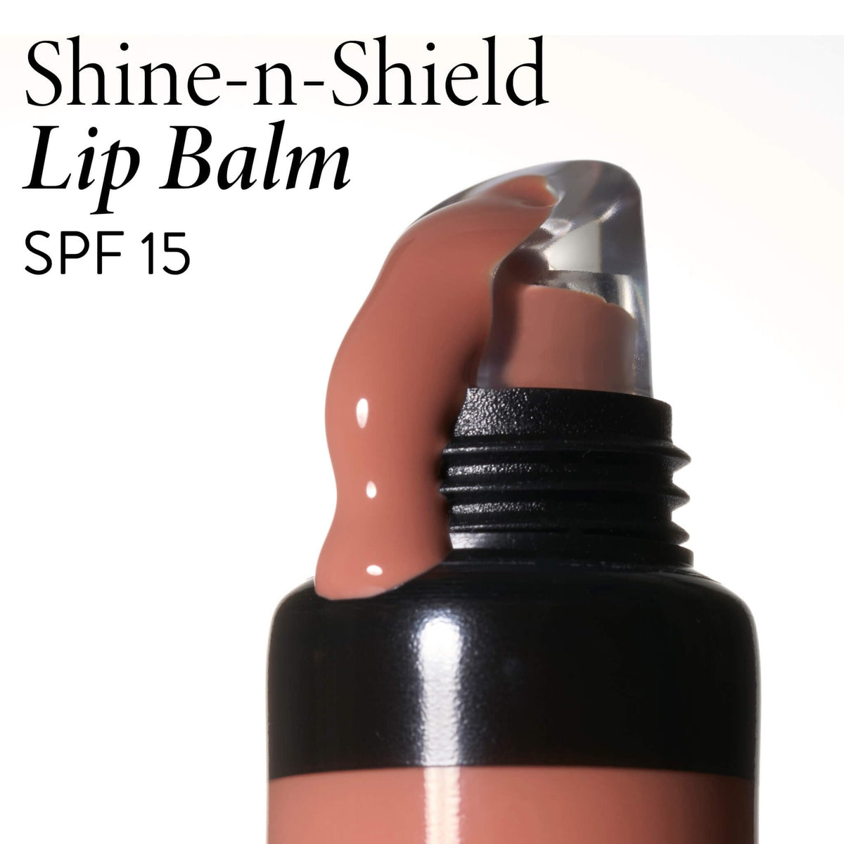 LAURA GELLER NEW YORK Shine-n-Shield lip balm color swatch on lips.