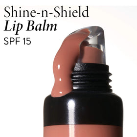 LAURA GELLER NEW YORK Shine-n-Shield lip balm color swatch on lips.