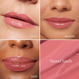 LAURA GELLER NEW YORK Shine-n-Shield lip balm Sunset Sands swatch shows flattering pink tint for all tones.