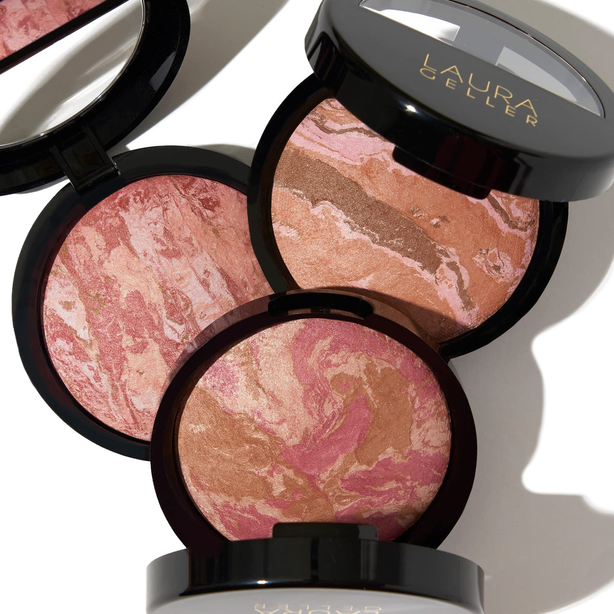 LAURA GELLER NEW YORK luminous finish brightens cheek with weightless feel
