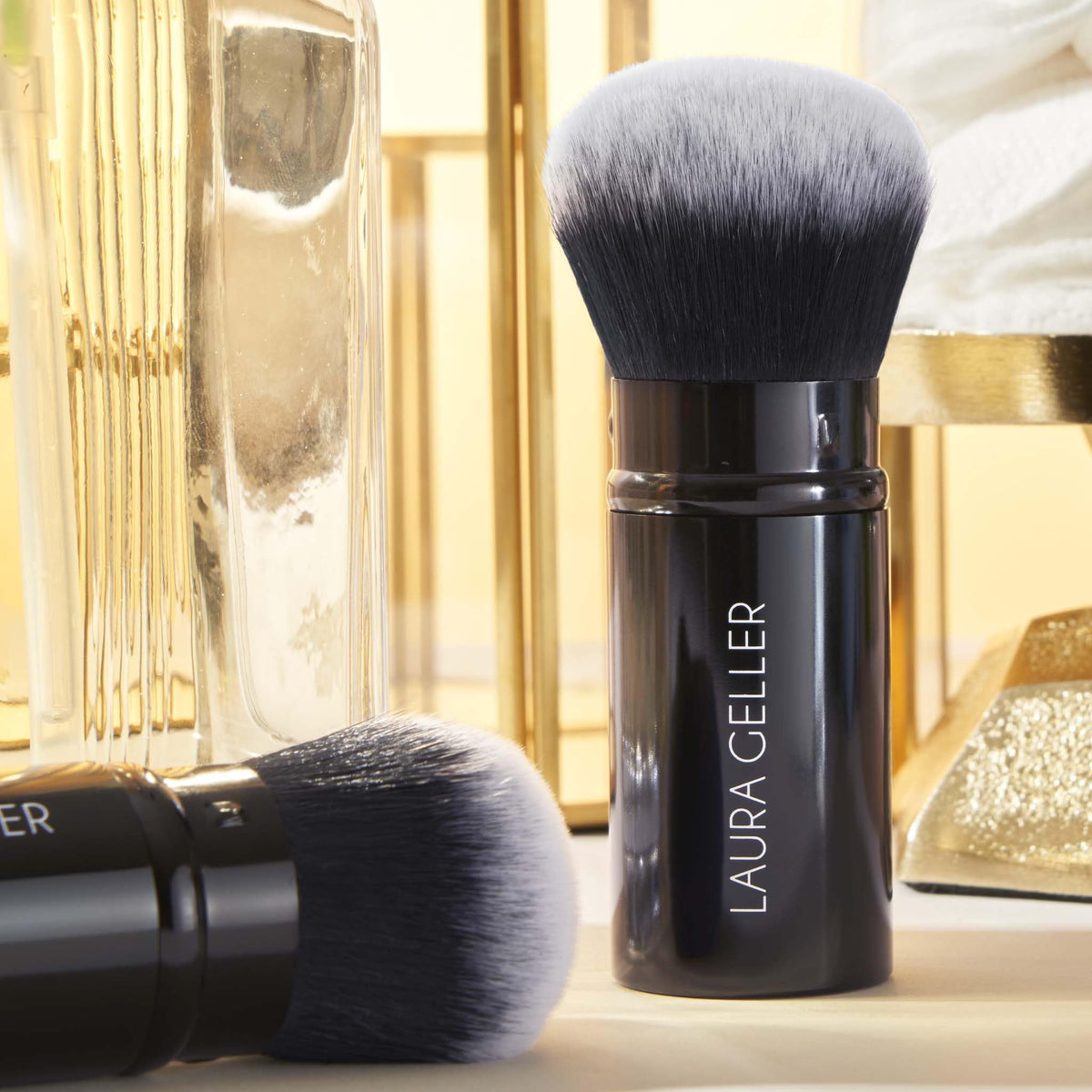 Laura Geller New York Spackle primer travel case ready for on-the-go prep.