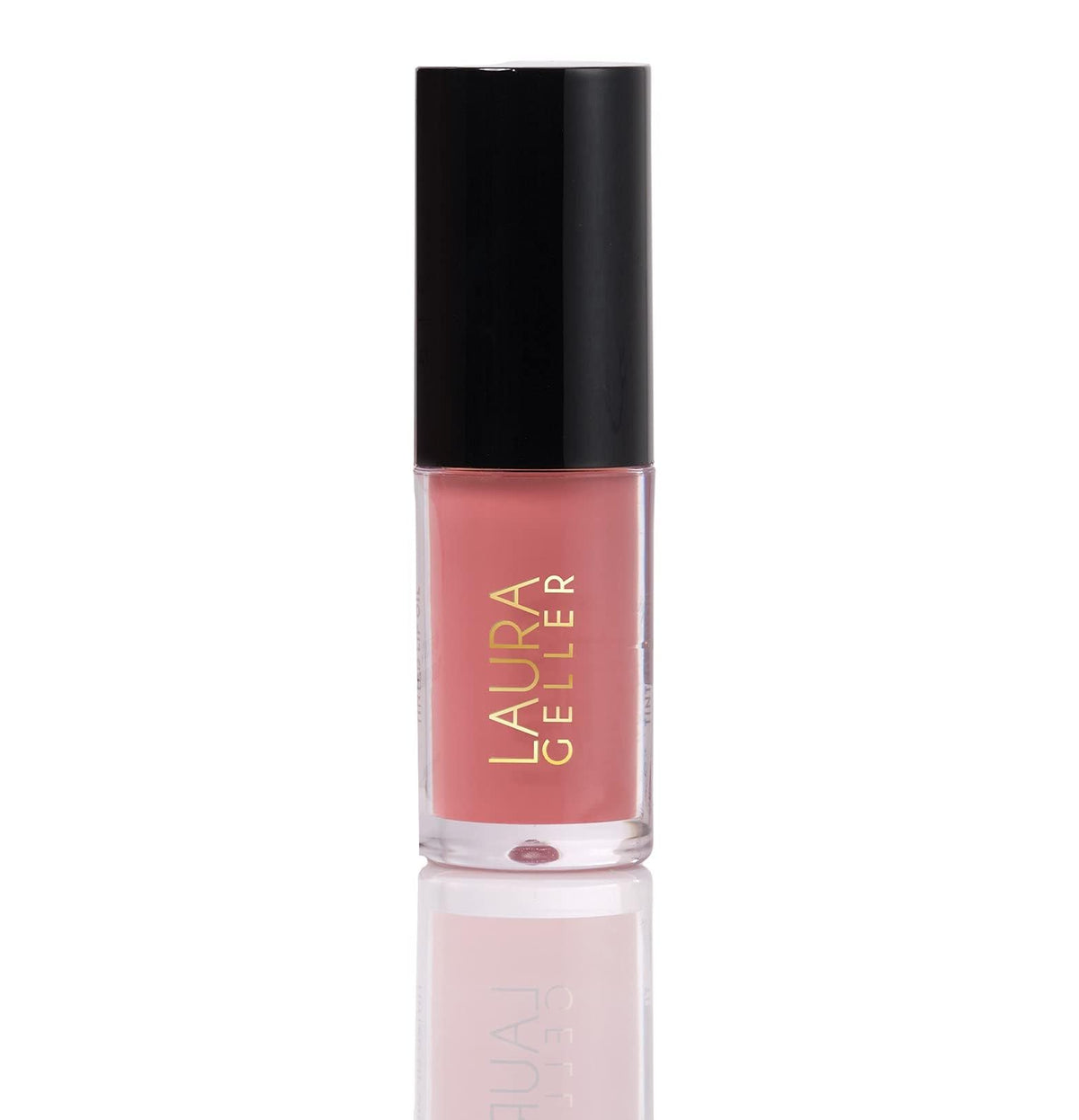 LAURA GELLER NEW YORK Treat-n-Go lip oil bottle closeup provides rich hydration and shine.
