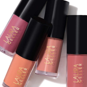 LAURA GELLER NEW YORK Treat-n-Go lip oil swatch on hand reveals tint and glow.
