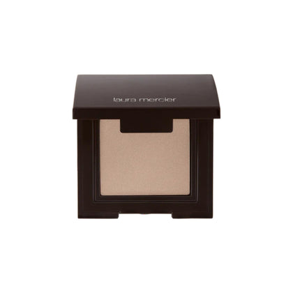 Laura Mercier Eye Shadow Topaz in luster finish enhances lid brightness.