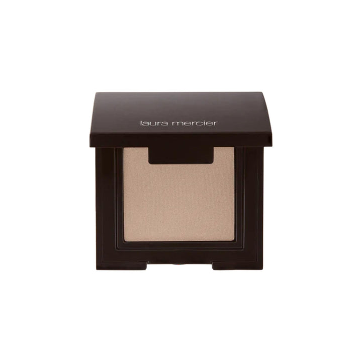 Laura Mercier Eye Shadow Topaz in luster finish enhances lid brightness.