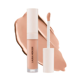 Laura Mercier Real Flawless Serum Concealer packaging close-up shows premium design and transparency