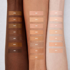 Swatch of Laura Mercier Real Flawless Serum Concealer 2C1 on skin with cool undertones.