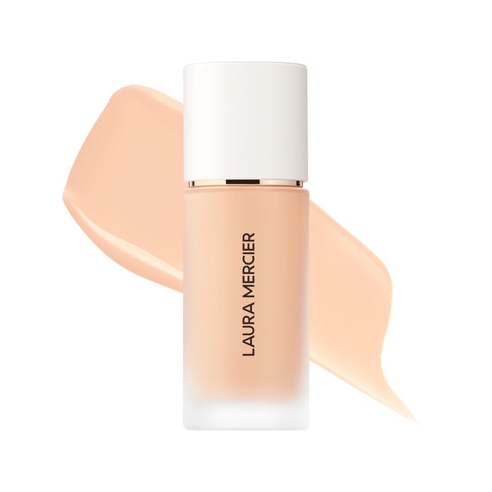 Laura Mercier Real Flawless foundation bottle closeup showing premium packaging and skin-blurring finish