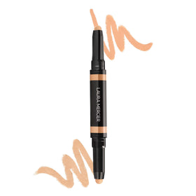 Laura Mercier Secret Camouflage Brighten and Correct Duo concealer stick close-up brightens under-eye.