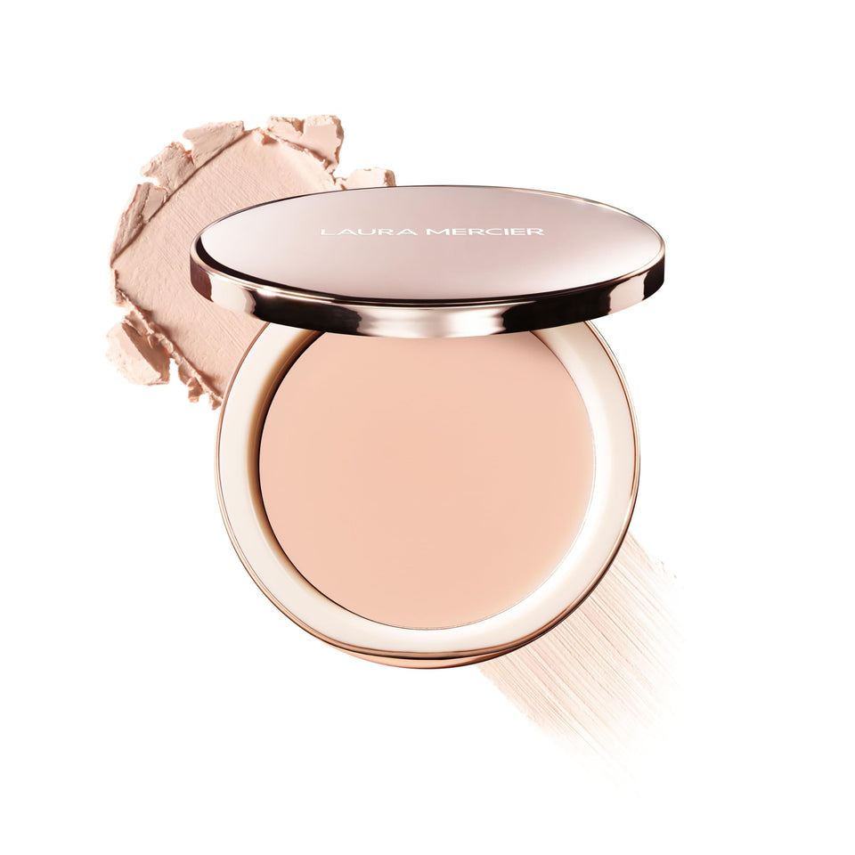 Laura Mercier Tinted Blur Balm packaging shown for travel-friendly use.