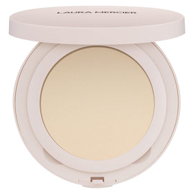 Laura Mercier Ultra-Blur translucent powder with puff for on-the-go setting.