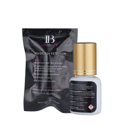 LAVALANDO IB Beauty Pro Volume Glue gold cap close-up demonstrating premium salon adhesive.