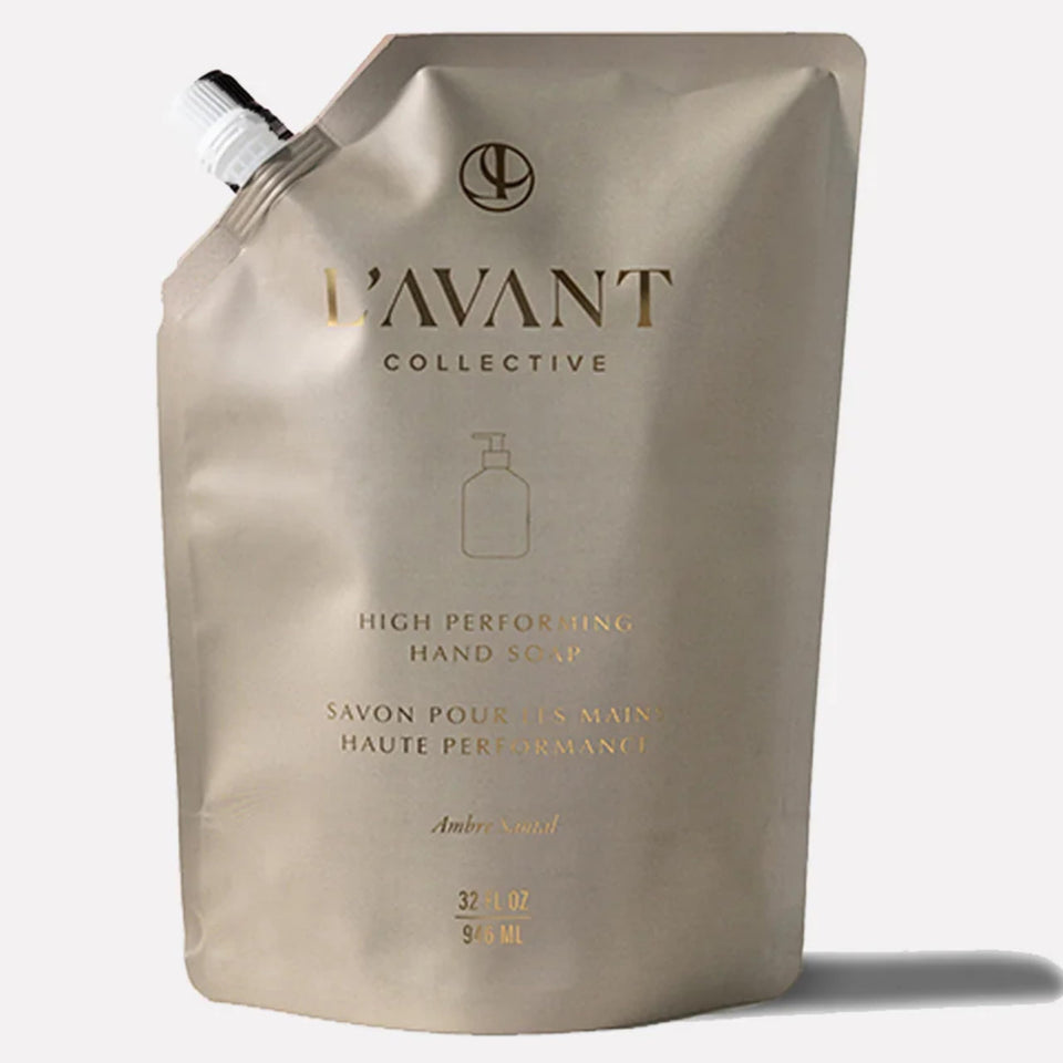 L’AVANT Collective Ambre Santal bottle pour for daily hand care.